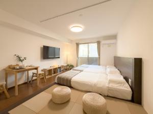 ISSHUKU NOMA池袋II 202 - Quad Room