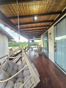 Vista da Lagoa Aruá, 2 suítes com Churrasqueira