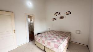 Casa a 700 metros da praia com churrasqueira e wifi