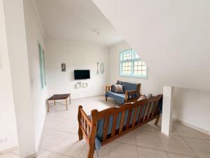 Casa a 700 metros da praia com churrasqueira e wifi