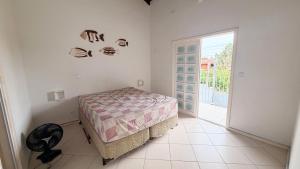 Casa a 700 metros da praia com churrasqueira e wifi