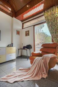 Dilli Villa by ELIVAAS with Private Movie Theatre & Pvt Pool with Hill Views