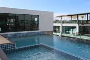 Partial Sea View 1BR Grand KataVIP 1607