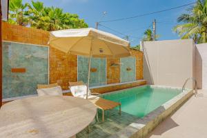 GB133 Casa com 4 Suítes e Piscina - Guarajuba