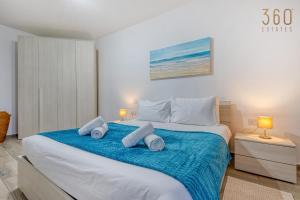 A lovely 2BR home, fully equipped with WIFI & AC by 360 Estates