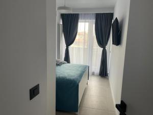 Eleven Odyssey Apartment