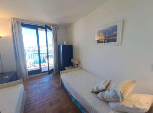 Brigantine112 - Appt 4 pers climatisé vue mer avec accès direct au port, proche de St Tropez et ses plages