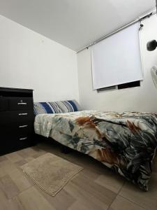 Habitación confortable cama doble Ibagué