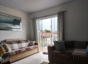 Sobrado amplo e aconchegante, onde o mar é sua janela