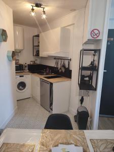 Studio plein centre face au lac, cave vélo