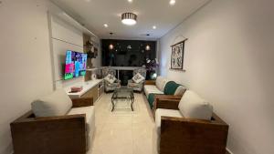 Apartamento Frente Mar Praia das Pitangueiras Guarujá 3 Suítes até 7 Hóspedes com Serviço de Praia