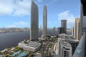 Waterfront Breathtaking 2BR Pool Burj Views Sleeps 7