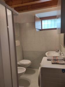 Grazioso appartamento con giardino e posto auto