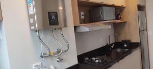 Acomodações completas e modernas em prédio com academia - MCP