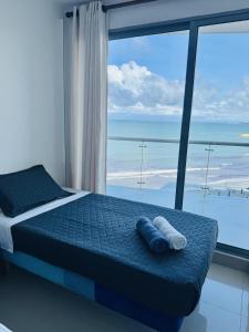 Beachfront Condo, infinitypool, gym, 5m Citywall