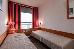 Résidence Nova - Appartement 2 pièces 6 personnes proche des pistes, des commerces, de la garderie et de lESF au centre de la station d’Arc 1800 MAE-2030