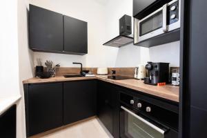 Résidence Appartement Moderne En Plein Centre Ville ! - Appartement moderne en plein centre ville ! MAE-2463