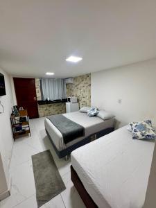 Loft 107 com Ar no bairro Muquiçaba, bem localizado para negócios e fácil acesso para todas as praias e montanhas da cidade - SEM vaga de garagem