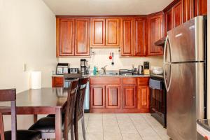 Modern One Bedroom Unit, Sofa Bed, Adjustable Queen Bed, 75 Inch Smart TV and Indoor Secure Parking