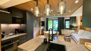 Résidence Fermes Emiguy - Appartement 4 personnes avec piscine MAE-4191