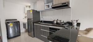 Apartamento en Las Quintas Cerca de Centros Comerciales, WiFi y Parqueadero