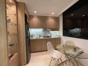 Suite moderna junto al Hotel Oro Verde con garaje