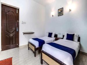 Hotel O Kaligambal illam