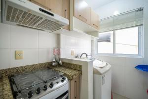 Garden Ville · Confortável apartamento na Praia de Bombas com ótima localização