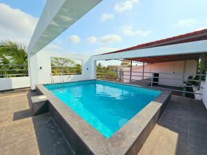 Serene 2BHK Porvorim Apartment with Forest View & Pool Access