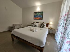 Serene 2BHK Porvorim Apartment with Forest View & Pool Access