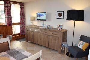 Appartements Cosylocation Super Besse : photos des chambres