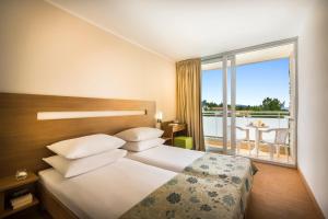 Superior Twin Room with Balcony - Seaside room in Miramar Sunny Hotel by Valamar