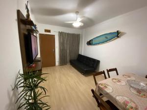 Pé na areia, praia do Gonzaguinha