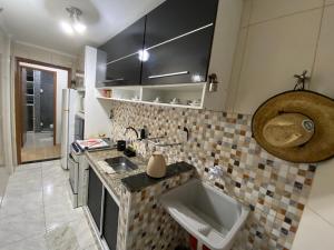 Pé na areia, praia do Gonzaguinha