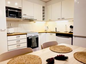 Cozy one-bedroom apartment with sauna and free carport parking