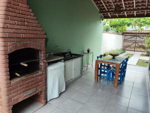 Casa na Boraceia, 100 M praia c roupas cama e banho