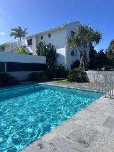 Endless Summer 2BR Apartment with Private Beach