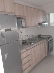 Apto impecável pé na areia para até 6 pessoas