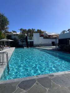 Endless Summer 2BR Apartment with Private Beach