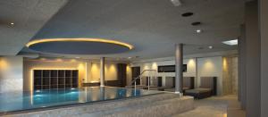 Aparthotel Familiaris - Family Apartments - Pools & Spa in Dolomites
