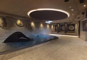 Aparthotel Familiaris - Family Apartments - Pools & Spa in Dolomites