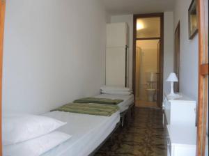 Family apartment steps from Pluto Beach