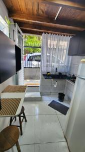 Kitnet Micro casa com varanda e privacidade