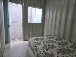 Apartamento Térreo em Itapema Bom Custo Ar condicionado e vaga de estacionamento QQ