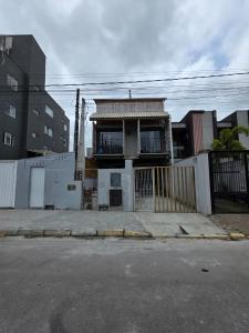 Apartamento Térreo em Itapema Bom Custo Ar condicionado e vaga de estacionamento QQ