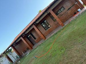 Brisa do Oceano - Pousada com quartos privativos e acomodações compartilhadas