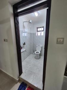 CM Snug stay -Naivegas Apartments