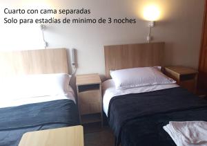 Cuarto con Cama King y Smart TV en apartamento compartido en Tunja
