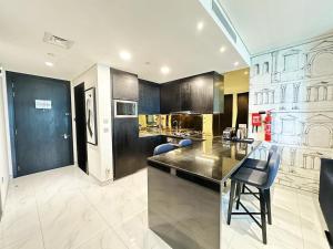 Petals Homes Millennium Atria 1 bedroom with Balcony