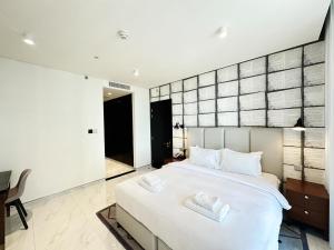 Petals Homes Millennium Atria 1 bedroom with Balcony